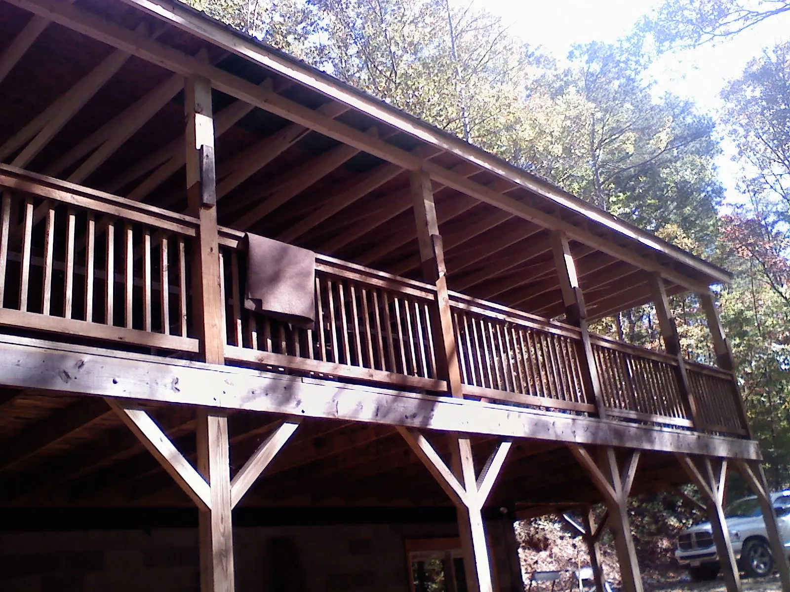 Timber framing under a new elevated porch and deck — Roof Leak Repair in East Stone Gap by Roofing Brothers